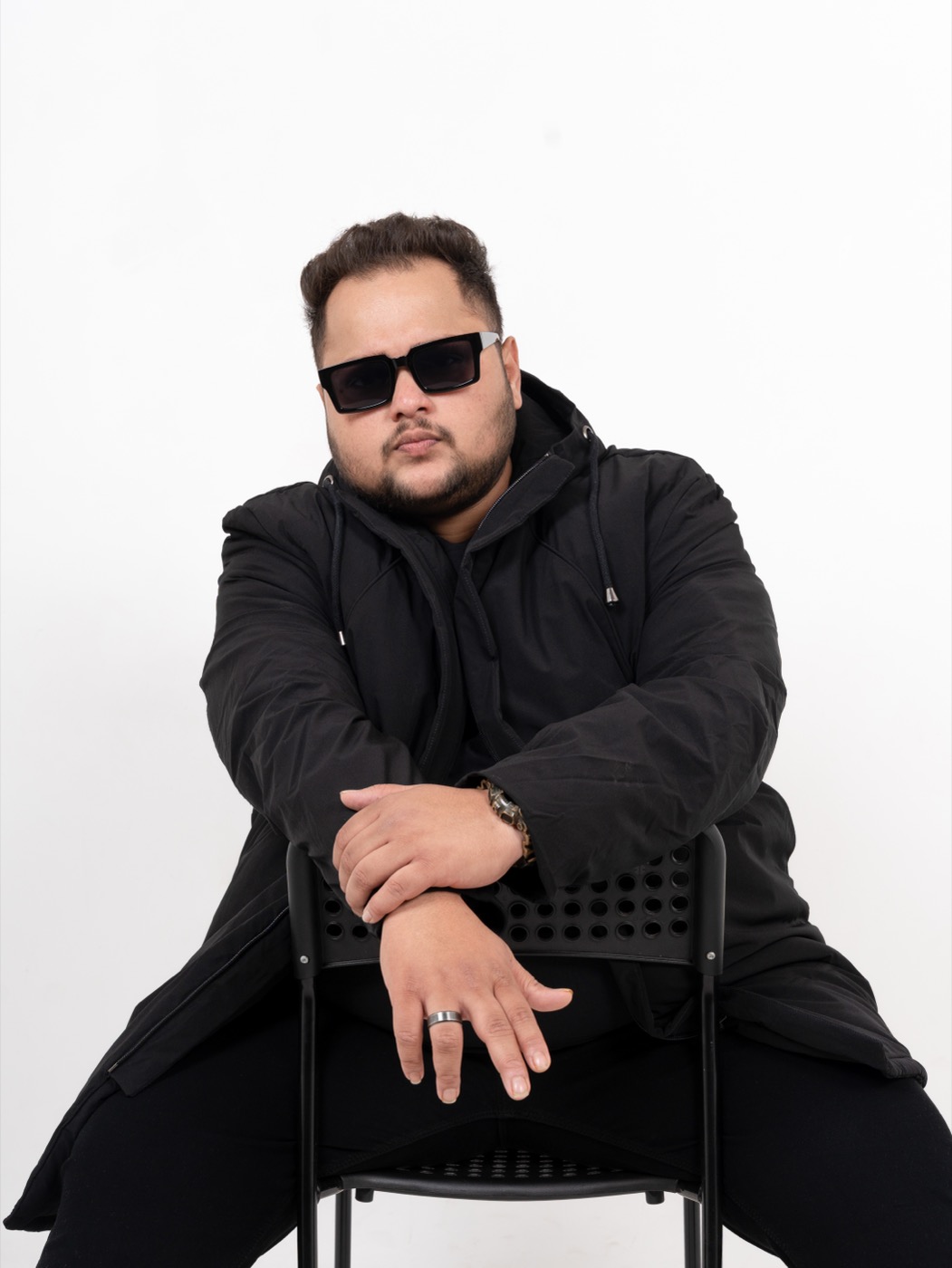 TEDD press photo — seated, studio